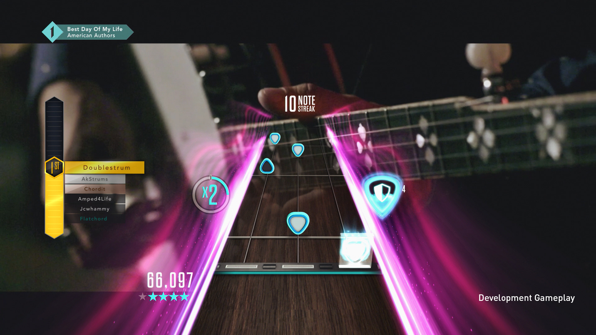 Guitar Hero Live gameplay on PS4 with invincibility hero power activated during a performance.