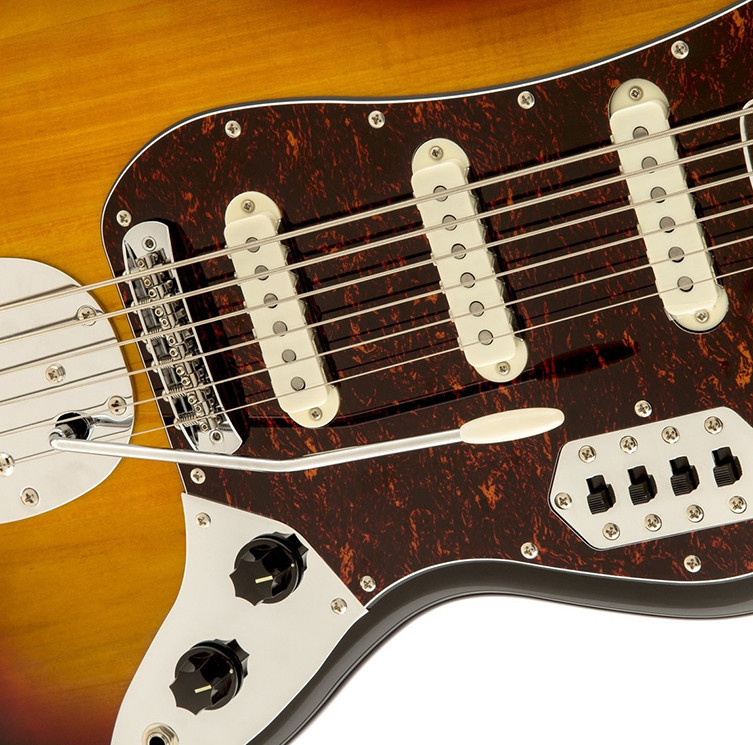 A Squier Classic Vibe Bass VI in 3-Tone Sunburst, showcasing its six strings and extended range, often mistaken for a baritone guitar but technically a bass.