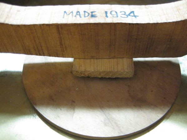 Crossbar with new block properly positioned in the resonator guitar body