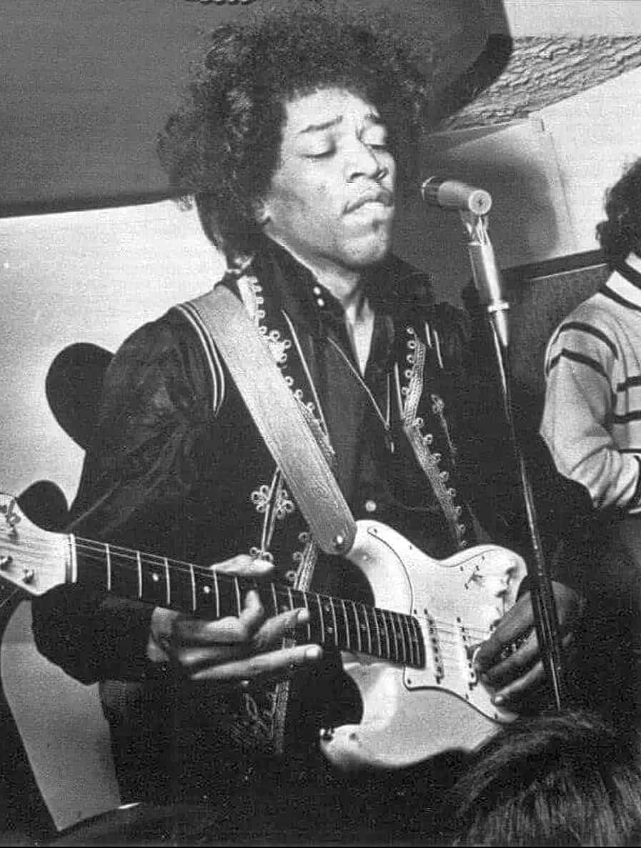 Jimi Hendrix masterfully playing his white Fender Stratocaster, affectionately nicknamed &quot;Linda,&quot; during his breakthrough period. Credit: Freddie Mudditt of Fietscher Fotos Ltd