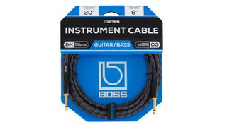 A Boss guitar cable in its blue packaging