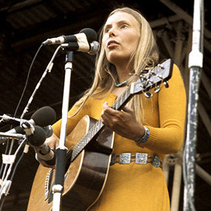 Joni Mitchell playing guitar