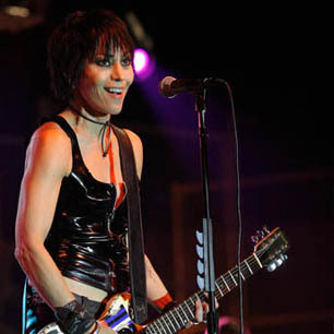Joan Jett playing electric guitar