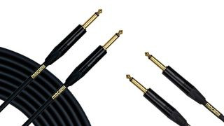 Four connectors for Mogami guitar cables with a coiled section in the corner