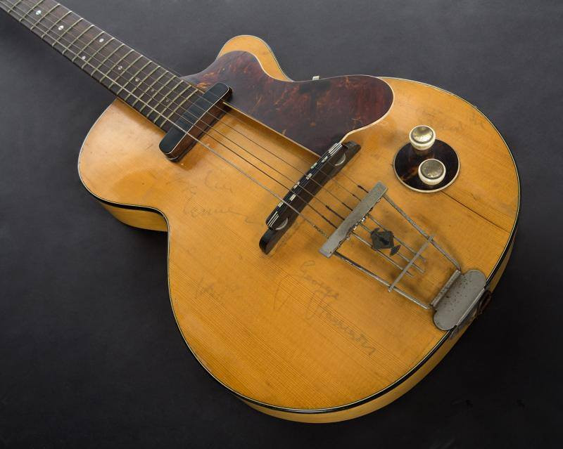 George Harrison's Hofner Club 40 guitar on display at auction
