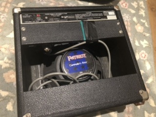 Close-up of Fender Champ 12 controls and speaker