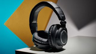 Audio-Technica ATH-M50xBT2 headphones on a colorful background