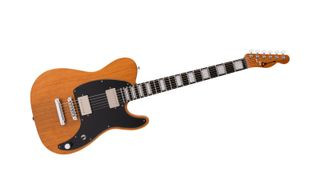 Angled shot of a natural wood Charvel Pro-Mod Joe Duplantier San Dimas Style 2 electric guitar