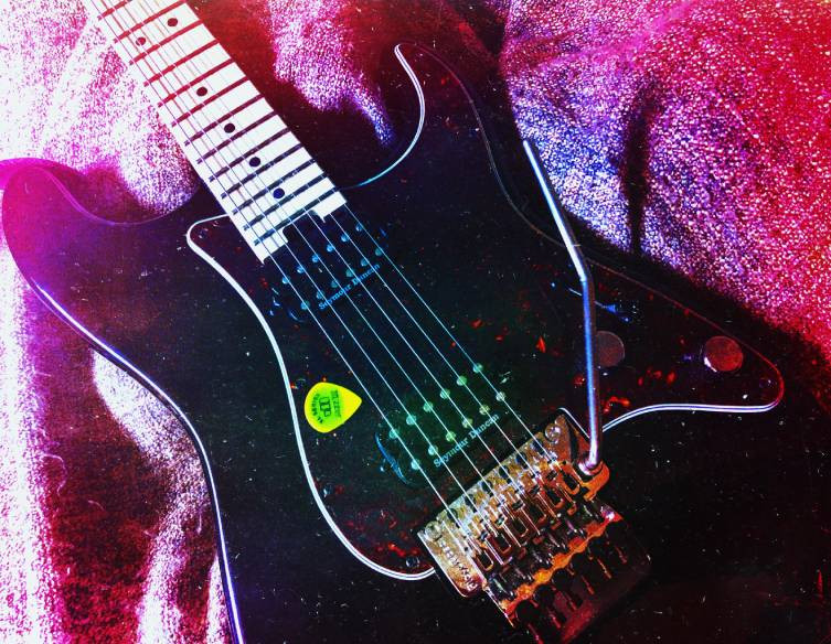 Charvel guitar displayed in a store, representing difficult guitar solos