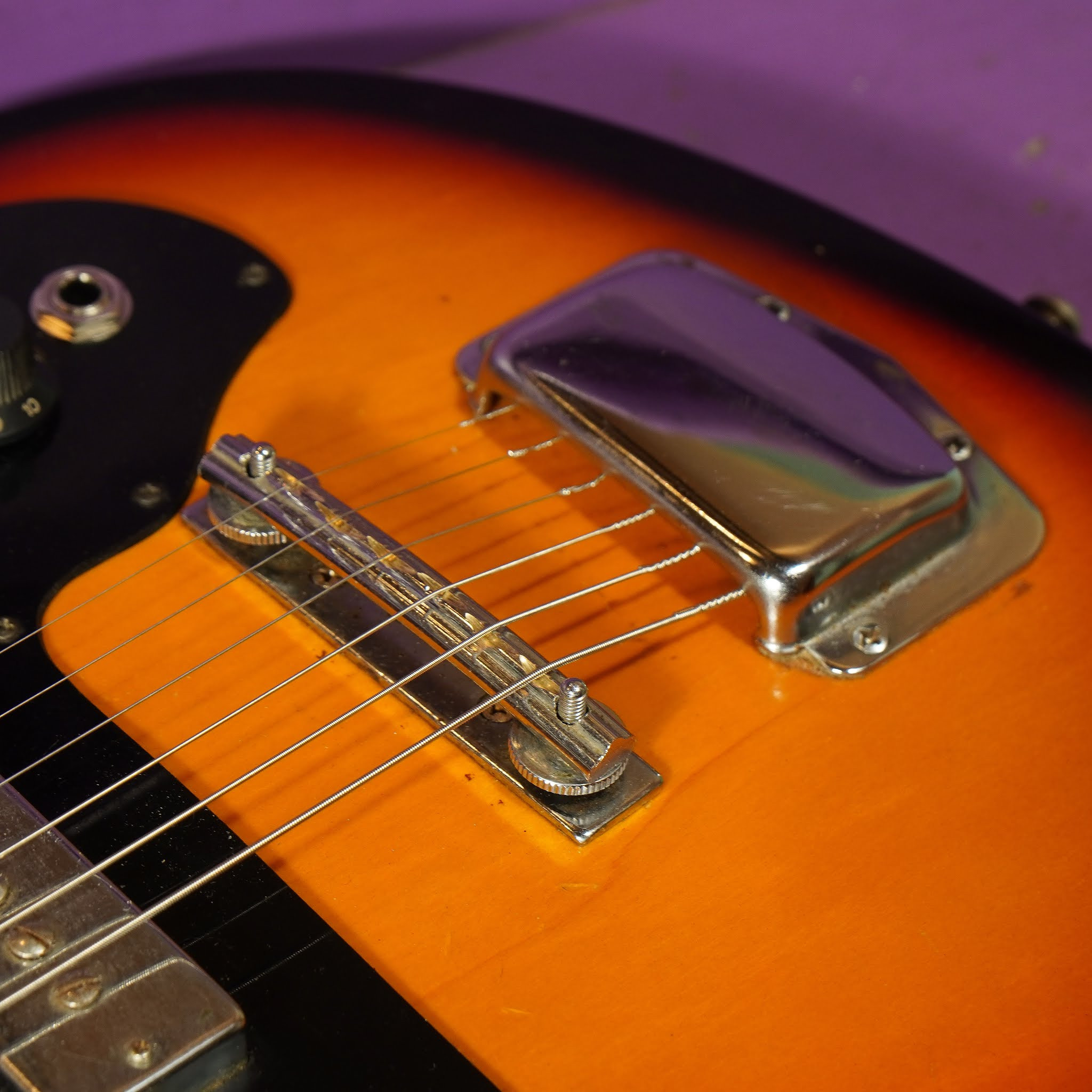 Image of the guitar's body from a different angle, emphasizing the shape and finish, and providing a sense of its overall aesthetic.