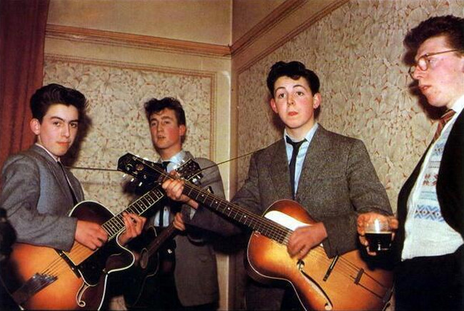 George Harrison with The Quarry Men holding his Hofner President guitar