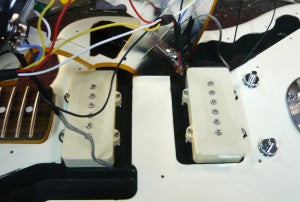 Pedalboard featuring the EH J Mascis Big Muff pedal.