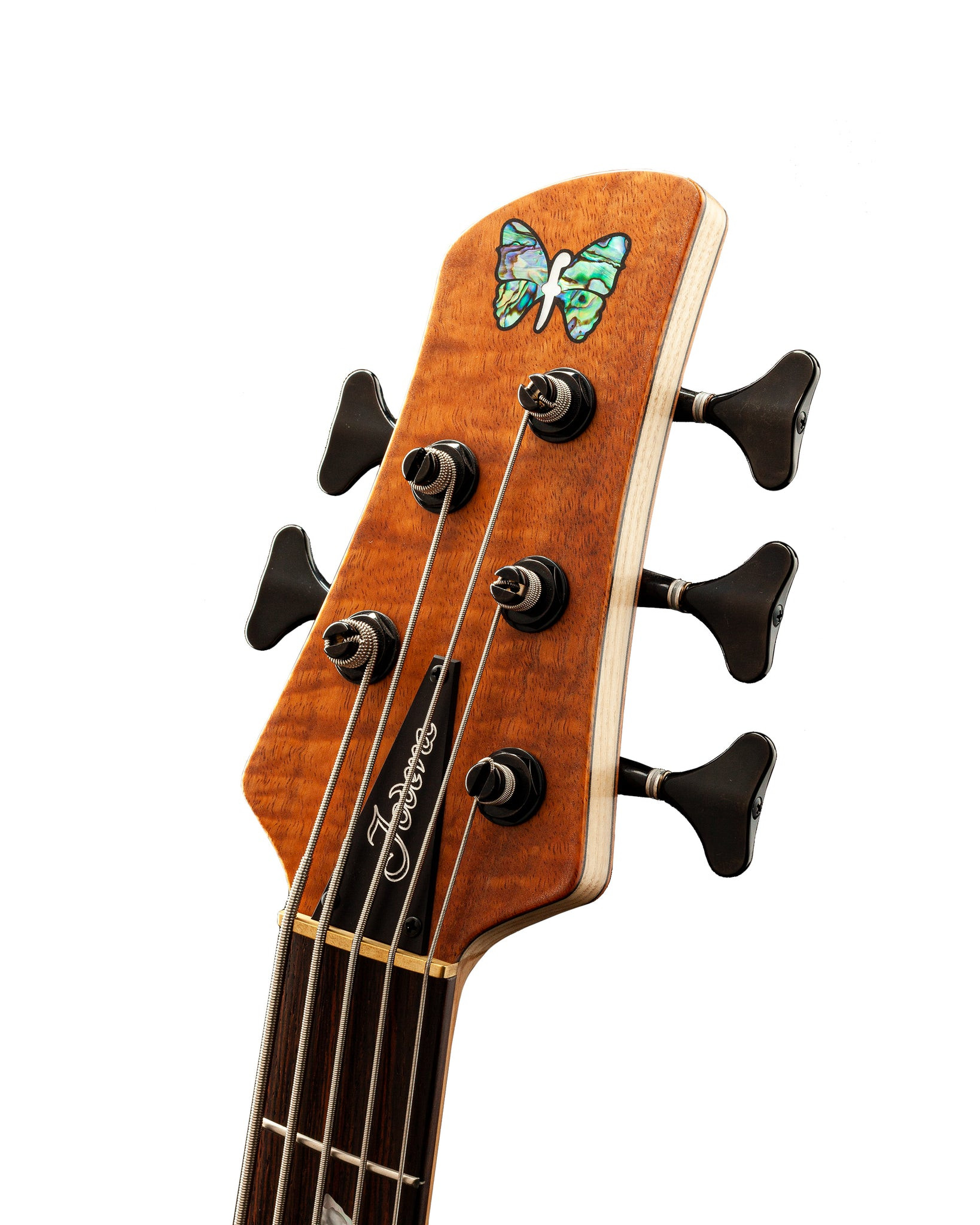 Macro shot of the butterfly inlay on the fretboard of the Butterfly Guitar, showing the variety of pearl and stone materials.