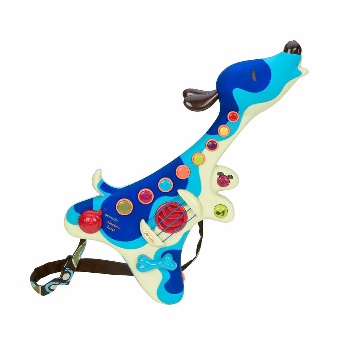 Toddler happily playing with the Woofer puppy guitar in electric mode