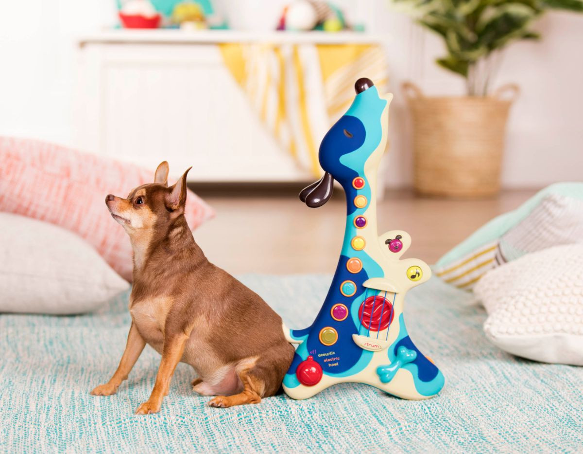 The Woofer puppy guitar in hound dog mode, showcasing its interactive features and design