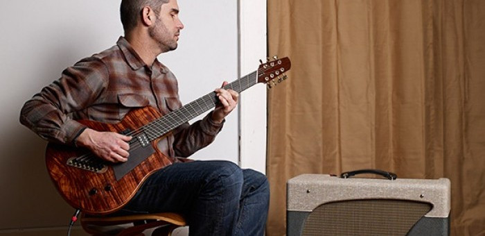 Charlie Hunter showcasing his innovative guitar techniques on his signature 7-string guitar.