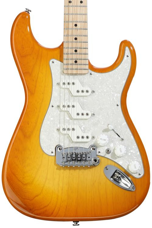 G&amp;L Fullerton Deluxe Comanche Electric Guitar Honeyburst. A warm honeyburst finish on a G&amp;L Comanche, showing the guitar's comfortable contours and versatile electronics. A visually appealing and sonically rich G&amp;L guitar.