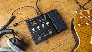 NUX MG-300 multi-effects pedal used as a pedal amplifier with headphones and guitar