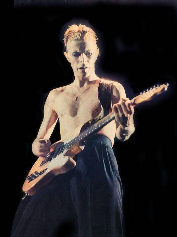 David Bowie playing a customized natural Fender Telecaster