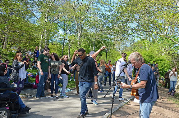 People dancing at a May performance, demonstrating the long-running appeal of the music