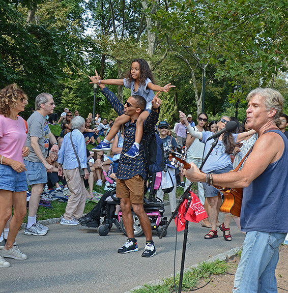 People dancing at an August performance, illustrating the consistent energy of the shows