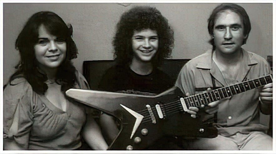 Young Dimebag Darrell wins his Dean guitar in 1981 with his mother Carolyn Abbott and Dean Zelinsky.