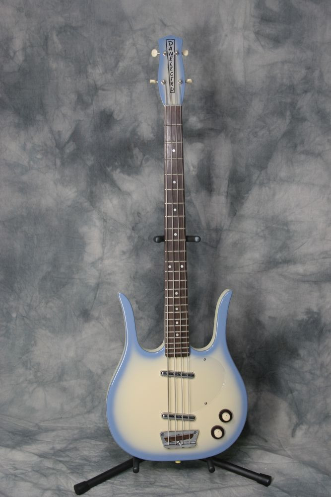 Image of the Danelectro Longhorn Bass guitar shortly after acquisition, showing the clear pickguard