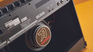 Close up of the speaker on a Boss Katana 50 modeling amplifier.