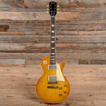 A Gibson Les Paul R8 Reissue in Lemonburst finish, showcasing its classic single-cutaway body and humbucker pickups