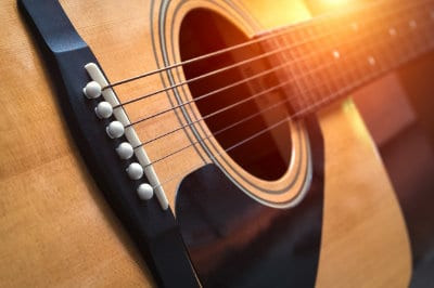 Different gauges of guitar strings for pain management