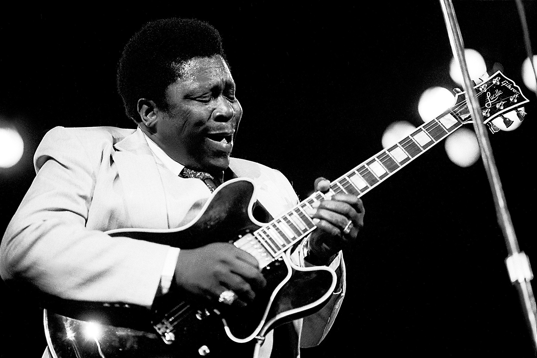 B.B. King performing at Rosemont Horizon, 1980, showcasing his expressive blues guitar style and his iconic &quot;Lucille&quot; guitar
