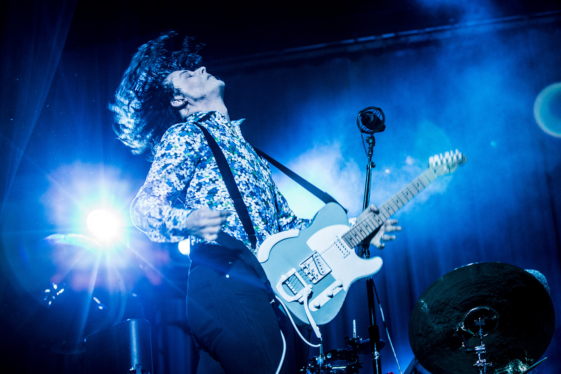 Jack White performing at Governors Ball 2014, showcasing his raw blues-garage style and energetic stage presence