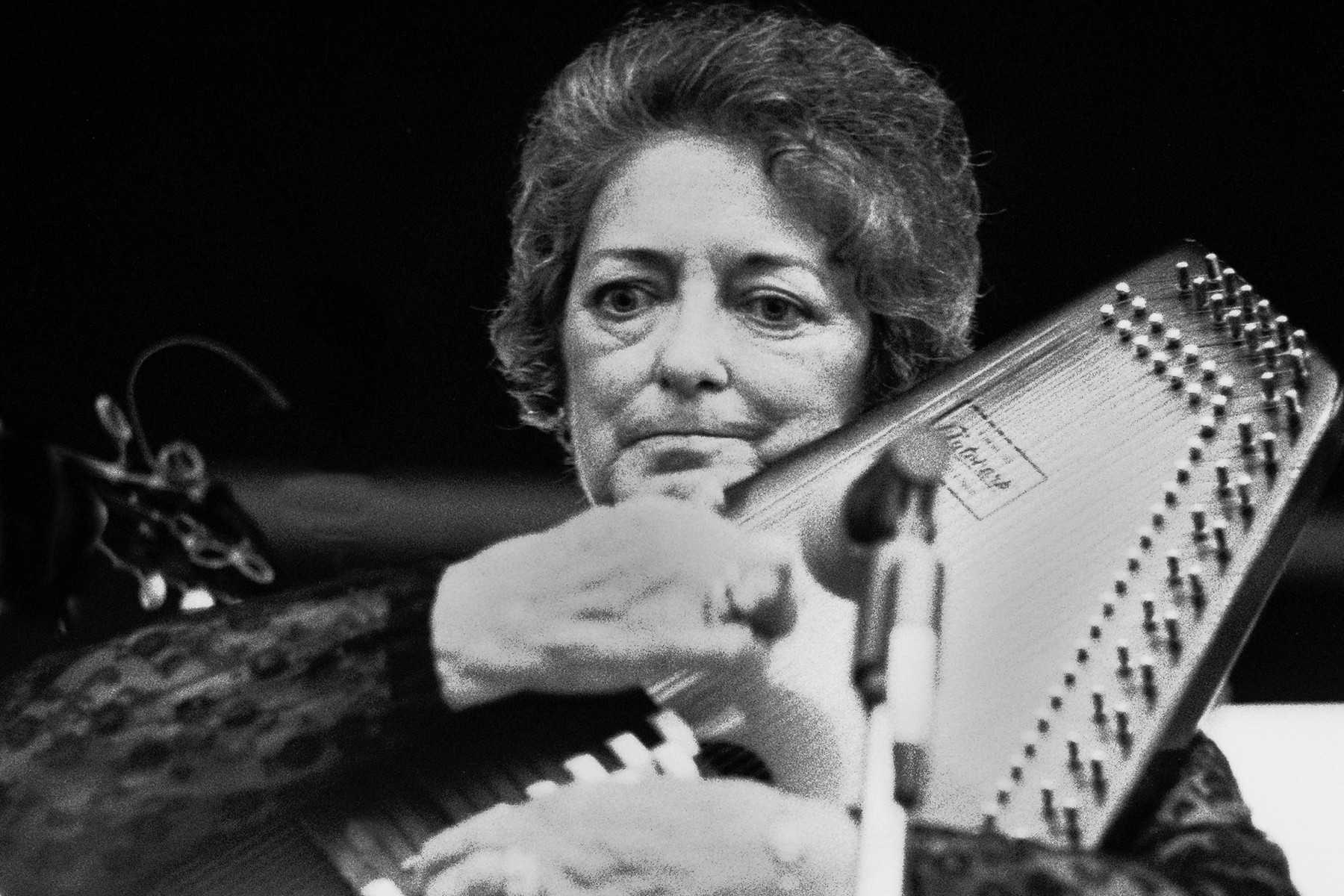 Maybelle Carter performing at the A.P. Carter Memorial Festival, 1977, showcasing her signature &quot;Carter Scratch&quot; guitar style