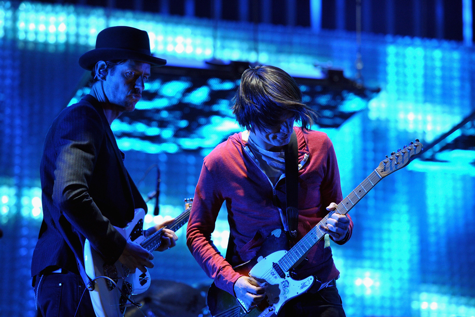 Jonny Greenwood and Ed O'Brien of Radiohead performing, showcasing their collaborative guitar work and textural soundscapes