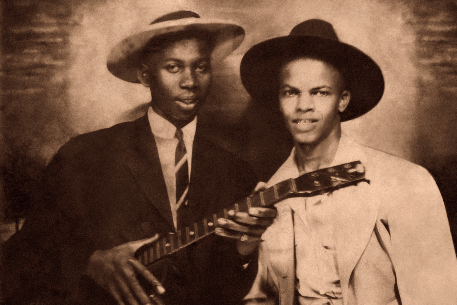 Robert Johnson in a retouched portrait from circa 1935, showcasing his legendary status and his profound influence on blues and rock guitar