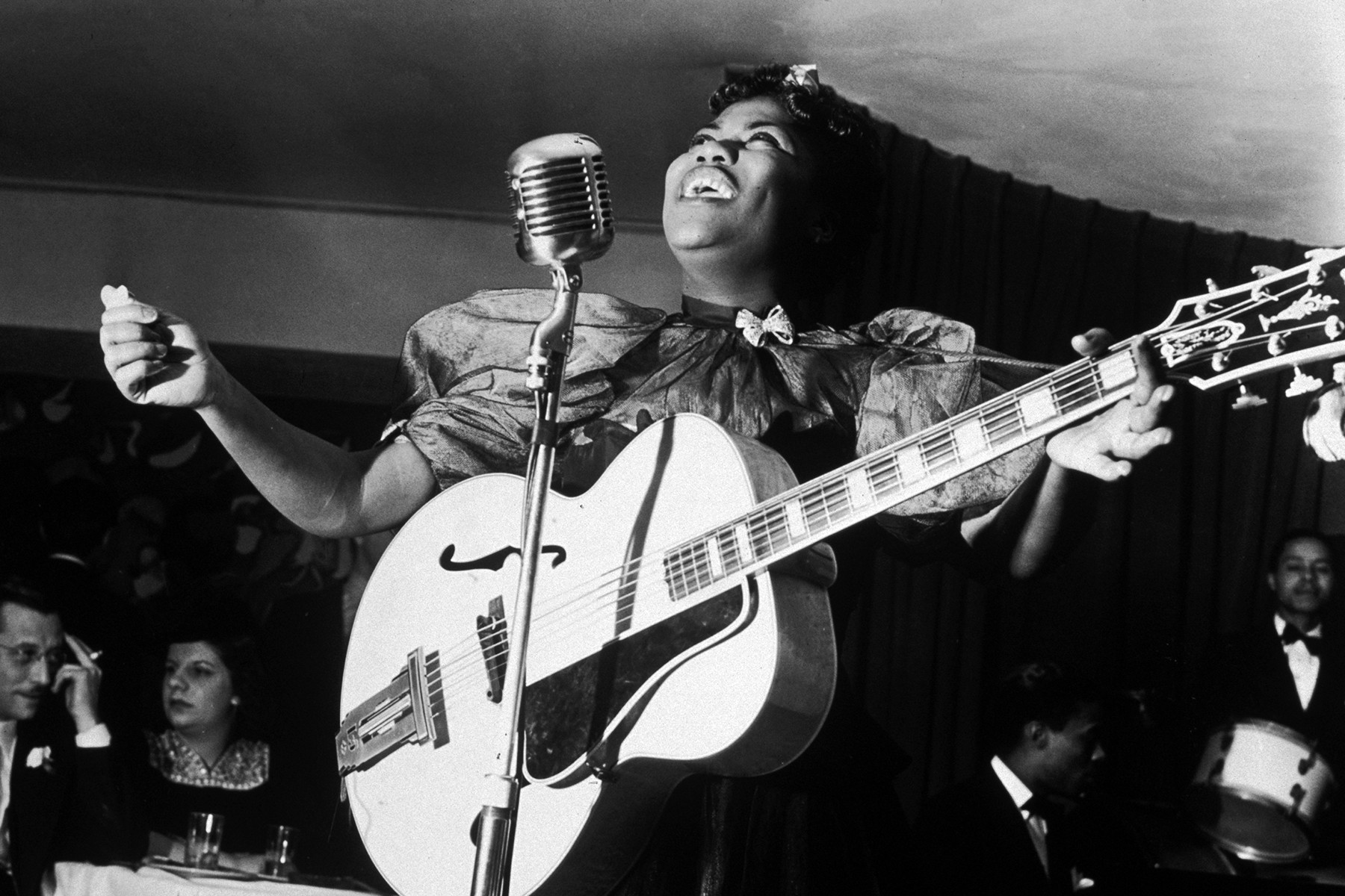 Sister Rosetta Tharpe performing at Cafe Society Downtown, 1940, pioneering the concept of guitar hero and blending gospel with electric guitar