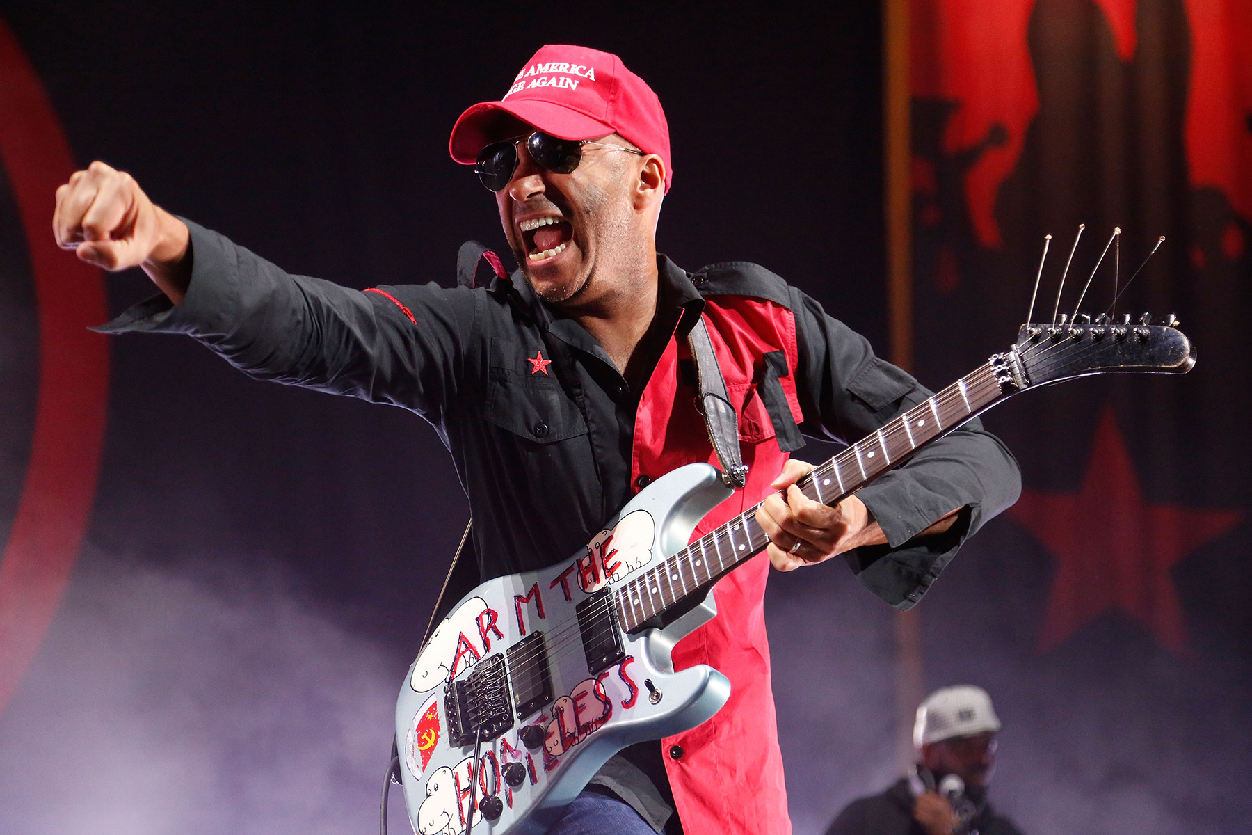 Tom Morello of Prophets of Rage performing, showcasing his innovative and effects-driven guitar style