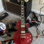 Epiphone Les Paul Modern in Vintage Sparkling Burgundy finish showcasing body details and hardware