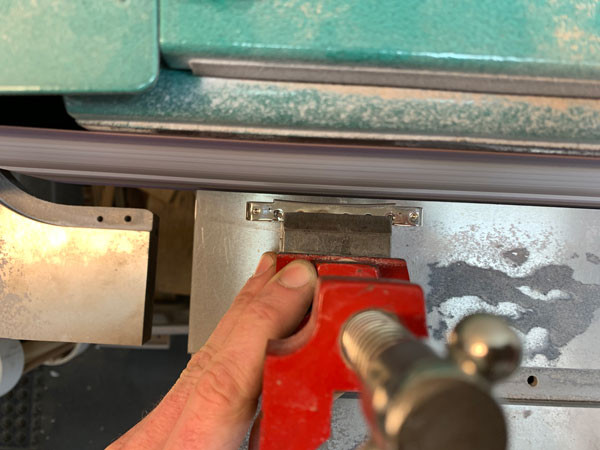 Modified Tune-o-matic bridge being fitted to the Gibson Dove