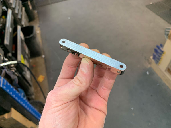 Close-up of the modified bridge on the Gibson Dove
