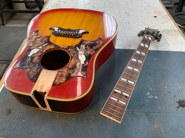 Using specialized tools for neck removal on the Gibson Dove