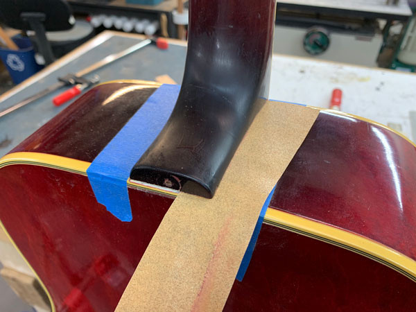 Fine-tuning the neck angle using pull-sanding on the Gibson Dove