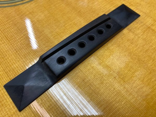 New left-handed saddle slot precisely cut by PLEK machine
