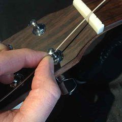 Threading the string through the machine head