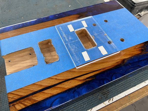 Completed pickup cavities routed into the guitar body, ready to house the TV Jones pickups and contribute to the guitar's sound.
