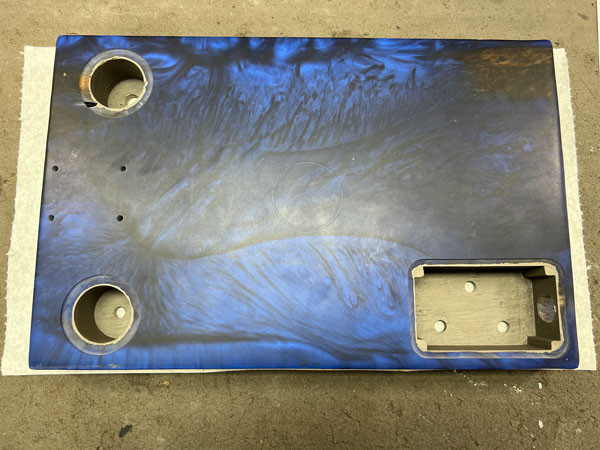Image of the guitar body after applying shielding paint, now drying and ready for the electronic components to be installed.