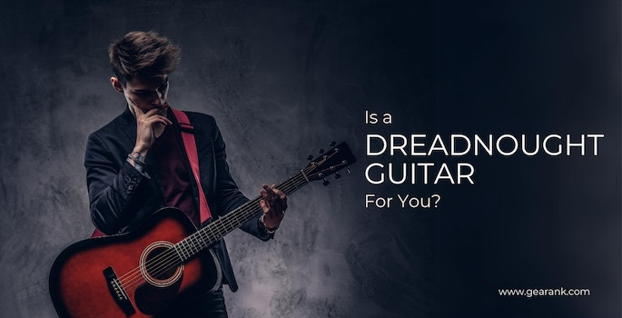 Musician playing a dreadnought acoustic guitar, suggesting its suitability for various playing styles.