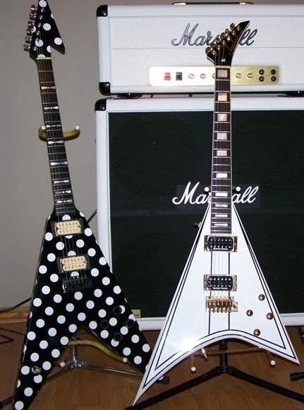 Close up of a Jackal Guitars Polka Dot Flying V guitar showing the detailed finish