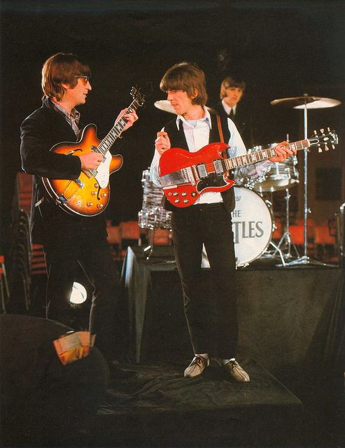 George Harrison with his 1964 Gibson SG Standard guitar