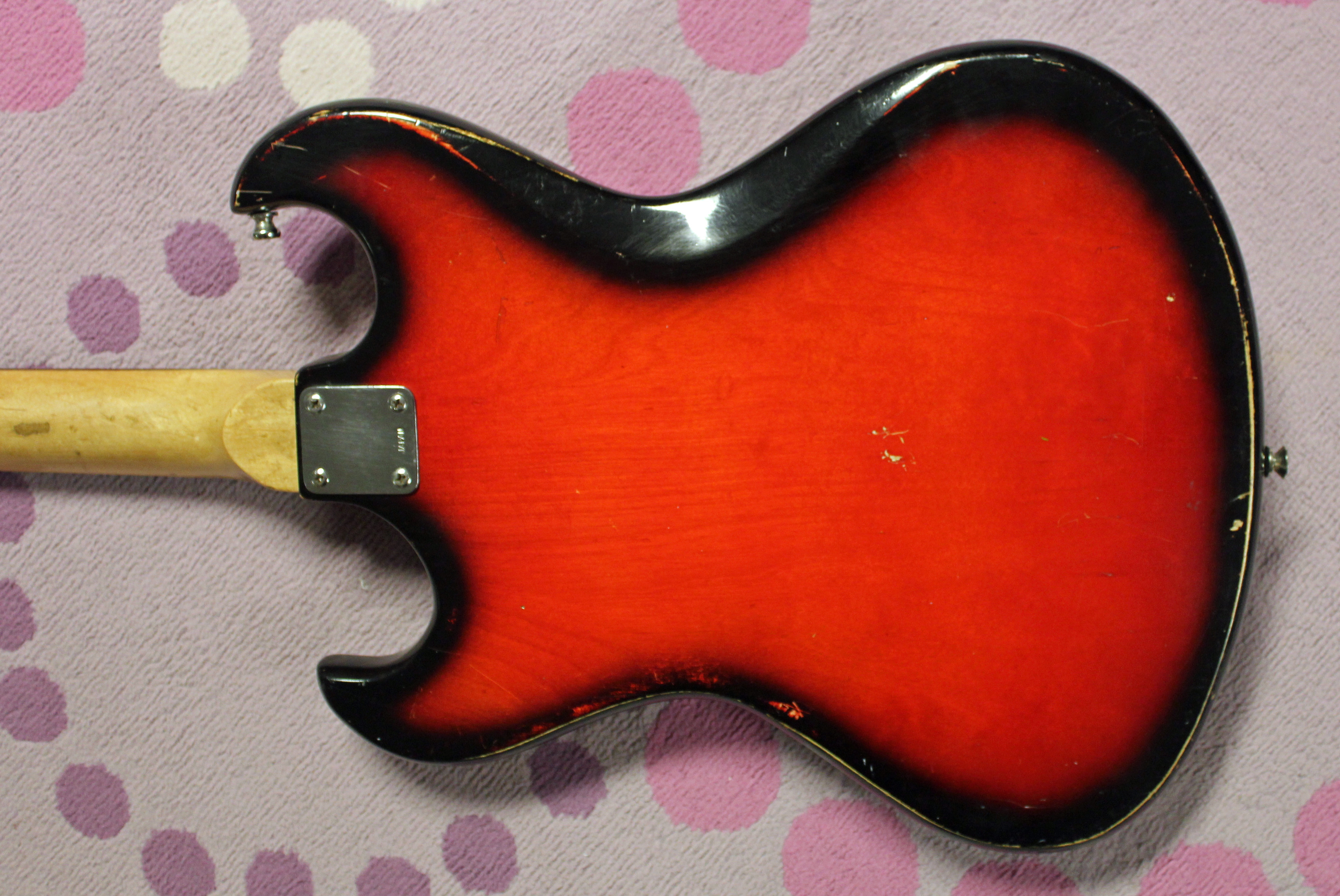 Close-up of the Kingston S4T guitar's body finish and hardware, emphasizing the quality of the finish and the overall craftsmanship from the Kawai factory.